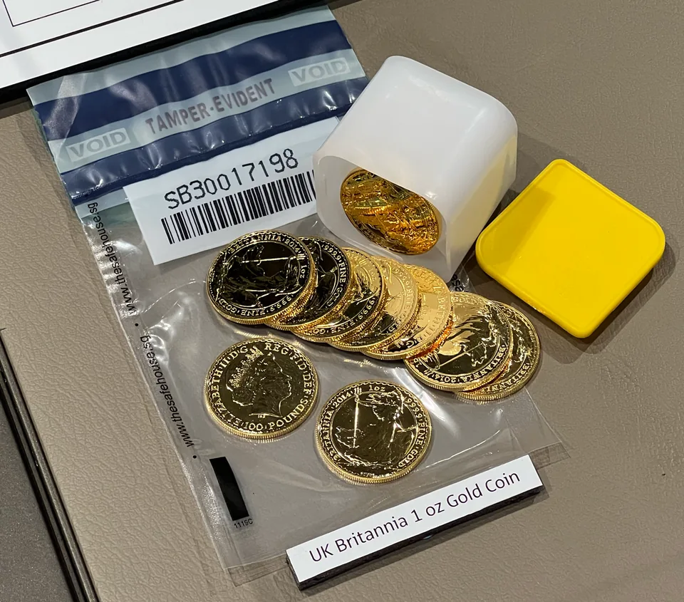 Gold coins and a numbered security bag for storage